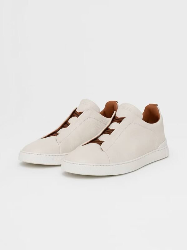 photo_1_2026-05-15_16-58-01 BASKETS TRIPLE STITCH™ EN CUIR DE CERF BLANC CASSÉ